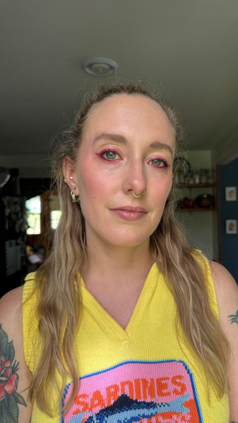photo of woman wearing pink eyeliner